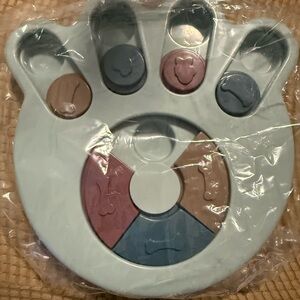 Interactive Paw-Shaped Treat Puzzle Toy in Pastel Blue and Mauve